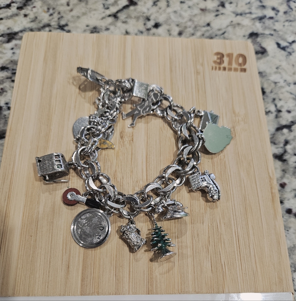 Sterling 925 Multi-Charm Bracelet all pieces are sterling